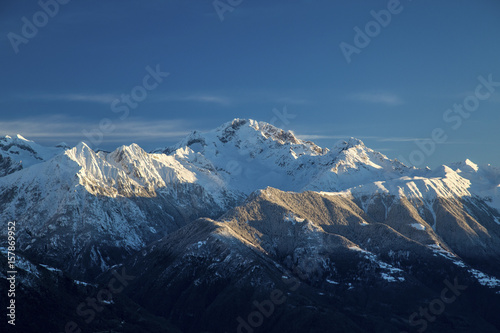 Snowy peaks and Mount Disgrazia in the background Olano Gerola Valley Valtellina Rhaetian Alps Lombardy Italy Europe