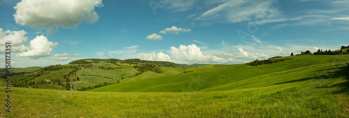 Beautiful panorama landscape of waves hills in rural nature, Tuscany farmland, Italy, Europe