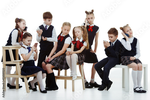 a group of school-aged children in the form of phones isolated on a white background
