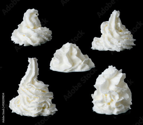 whipped cream on a black background