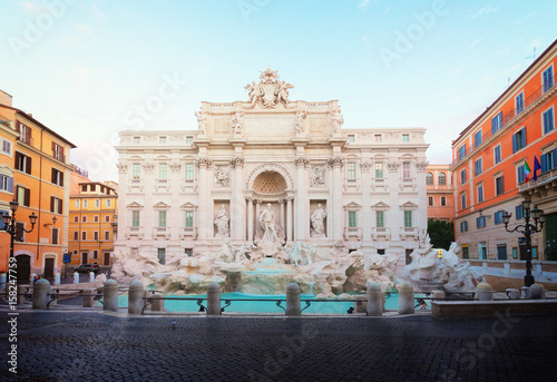 restored Fountain di Trevi in Rome in soft sunrise light, Italy, retro toned