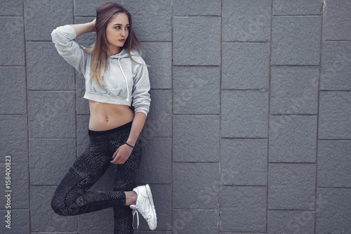 Fitness sporty girl wearing fashion clothes