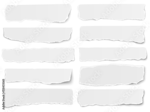 Set of elongated torn paper fragments isolated on white background