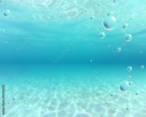 Underwater background. Blue sea water and bubbles
