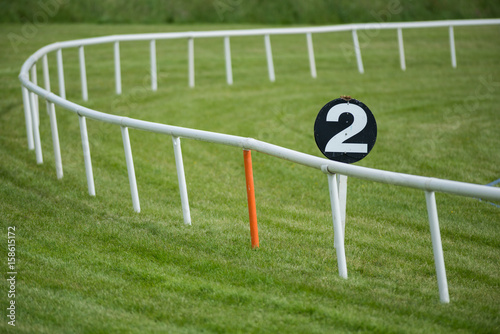 Horse racetrack railing barrier and furlong Distance marker
