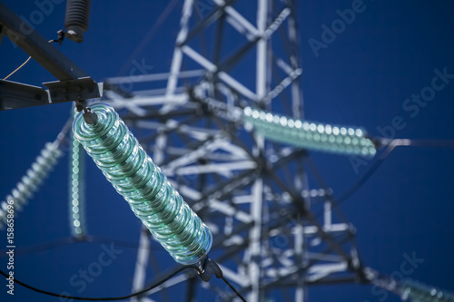 High voltage transmission power tower with glass insulators