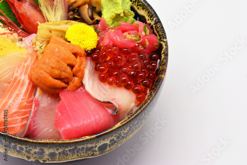 Mixed sashimi , raw and fresh Salmon, tuna, snapper, salmon roe, Uni, japanese eel, wasabi