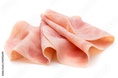 Thin slices of ham on white background.