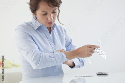Woman taking medication