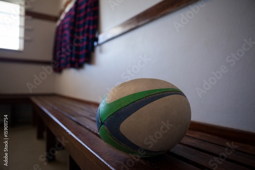 Close-up of rugby ball on bench
