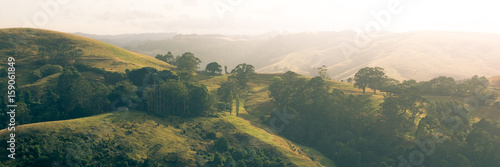 Rolling hills at sunrise