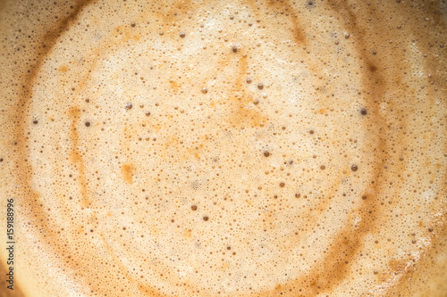 Close up image of hot coffee in white muck