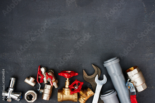 Top view of the plumbing equipment on a black background