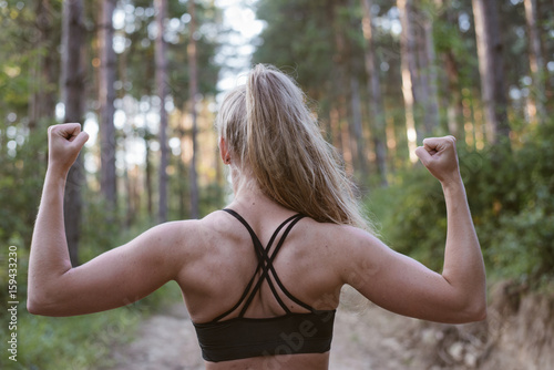 Sporty woman doing exercise outdoor