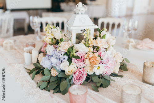 Pink wedding decoration with white and green flowers