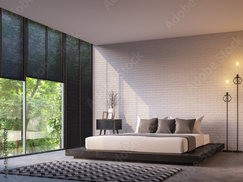 Modern loft bedroom with nature view 3d rendering image Furnished with Black wood furniture has concrete floor,white brick walls and large windows look out to nature.