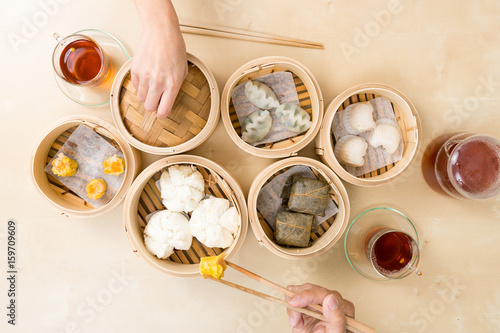 Top view of people eating dim sum