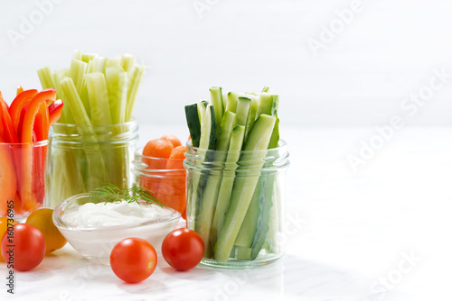 healthy snacks, mixed vegetables and yogurt and white background