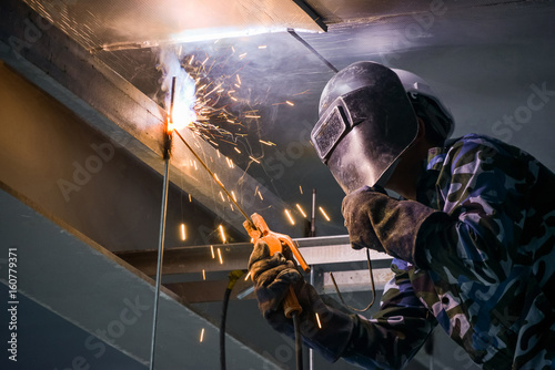 Arc welding of a steel in construction site