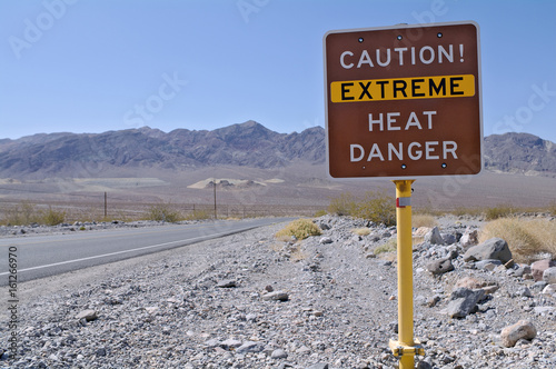 Sign in Death Valley National Park warning visitors of dangerous temperatures.