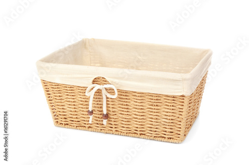 Empty wicker bread basket isolated on white