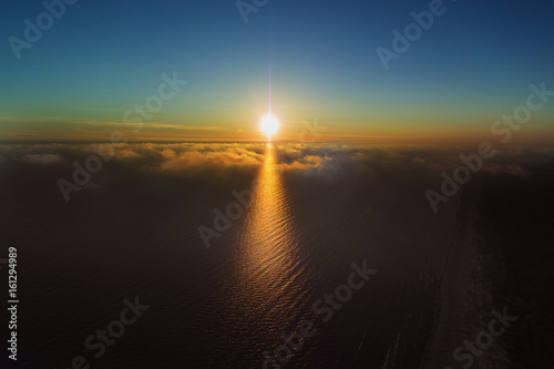 Summer solstice sunset in Baltic sea at latvian coast.