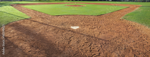 Youth baseball field viewed from behind home plate