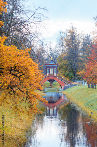 Autumn landscape with a Cross bridge.