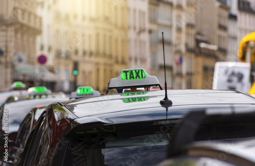 TAXI - green sign in Paris, France