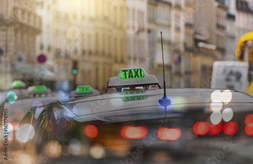 TAXI - green sign in Paris, France