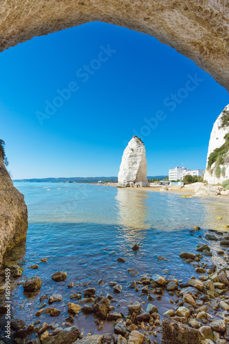 View beach of Vieste with Pizzomunno rock, Gargano coast, Apulia, South of Italy