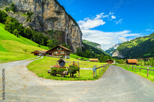 Famous Lauterbrunnen town and Staubbach waterfall, Bernese Oberland, Switzerland, Europe