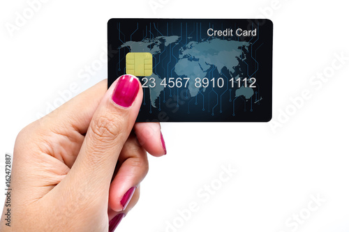 Credit Card holded by hand, close up, isolated on a white background