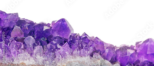lilac amethyst crystals closeup on white
