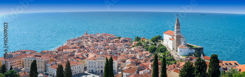 Panoramic view of Piran with St. George´s Parish Church in Slovenia. The church was bult in the venetian renaissance architectural style.