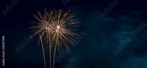 Orange Fireworks Blue Background