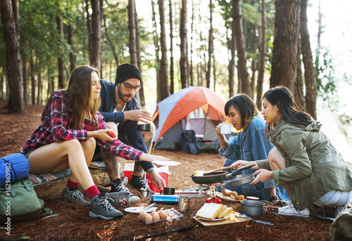 Friends Camping Cooking Breakfast Concept