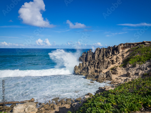 Wave crashing on cliff, Maha' elepu Heritage Trail, near Shipwreck Beach, Koloa, Kauai, Hawaii, USA