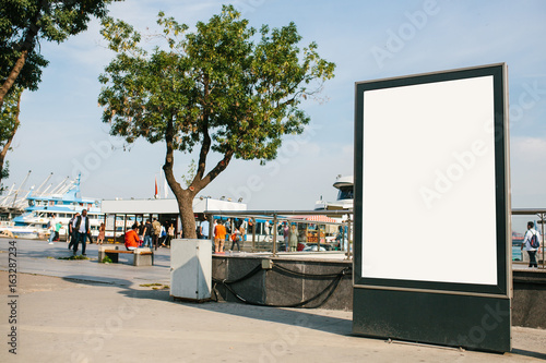 An empty billboard for advertising on the street near the seaport in Istanbul, Turkey. Street advertising.