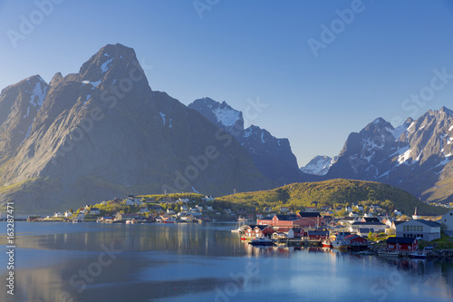 The Typical Norwegian fishing village of Reine under midnight sun