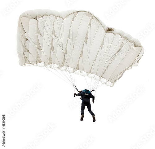 Jump of paratrooper with white parachute, isolated on a white background.