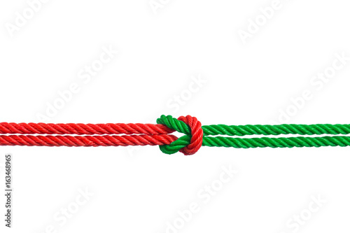 string of red and green rope knot isolated on white background