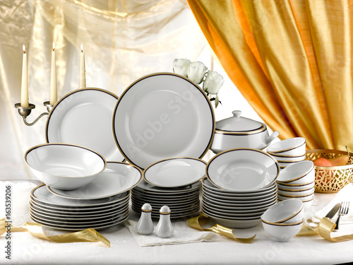 elegant set of porcelain plates ready for a buffet dinner