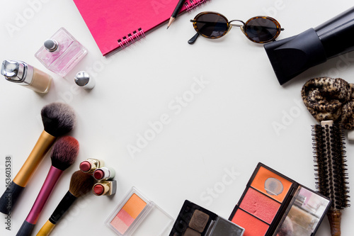 Top view woman's travel accessories on white background, space for text.