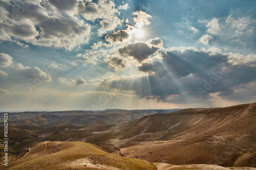 Light falling trough clouds at the Israeli mountains