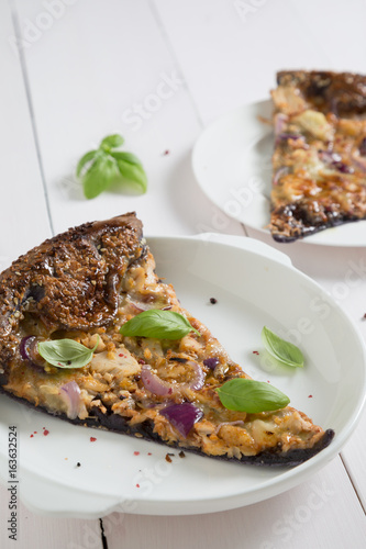 Pizza with chicken cheese and onions