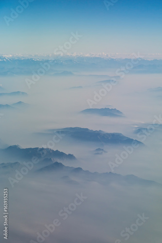 Aerial view of Alps mountains from airplane
