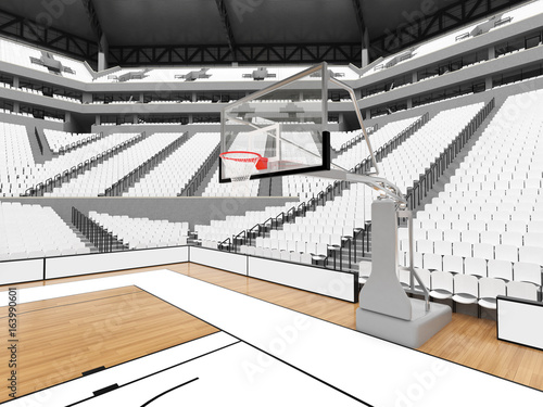 Large modern basketball arena with white seats