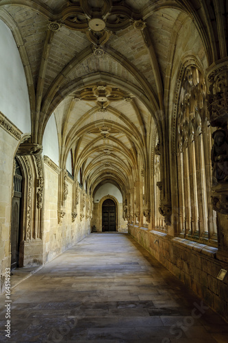 sight of the galleries of the cloister of the monastery of San Salvador in the Oña town in Burgos, Spain.