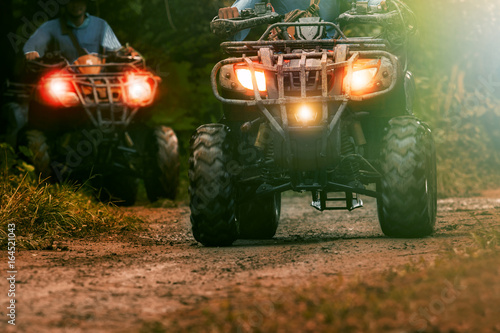 man riding atv vehicle on offroad track ,people outdoor sport activitiies theme